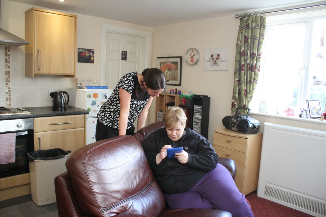 person on a sofa reading