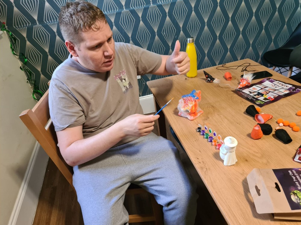 person doing arts and crafts