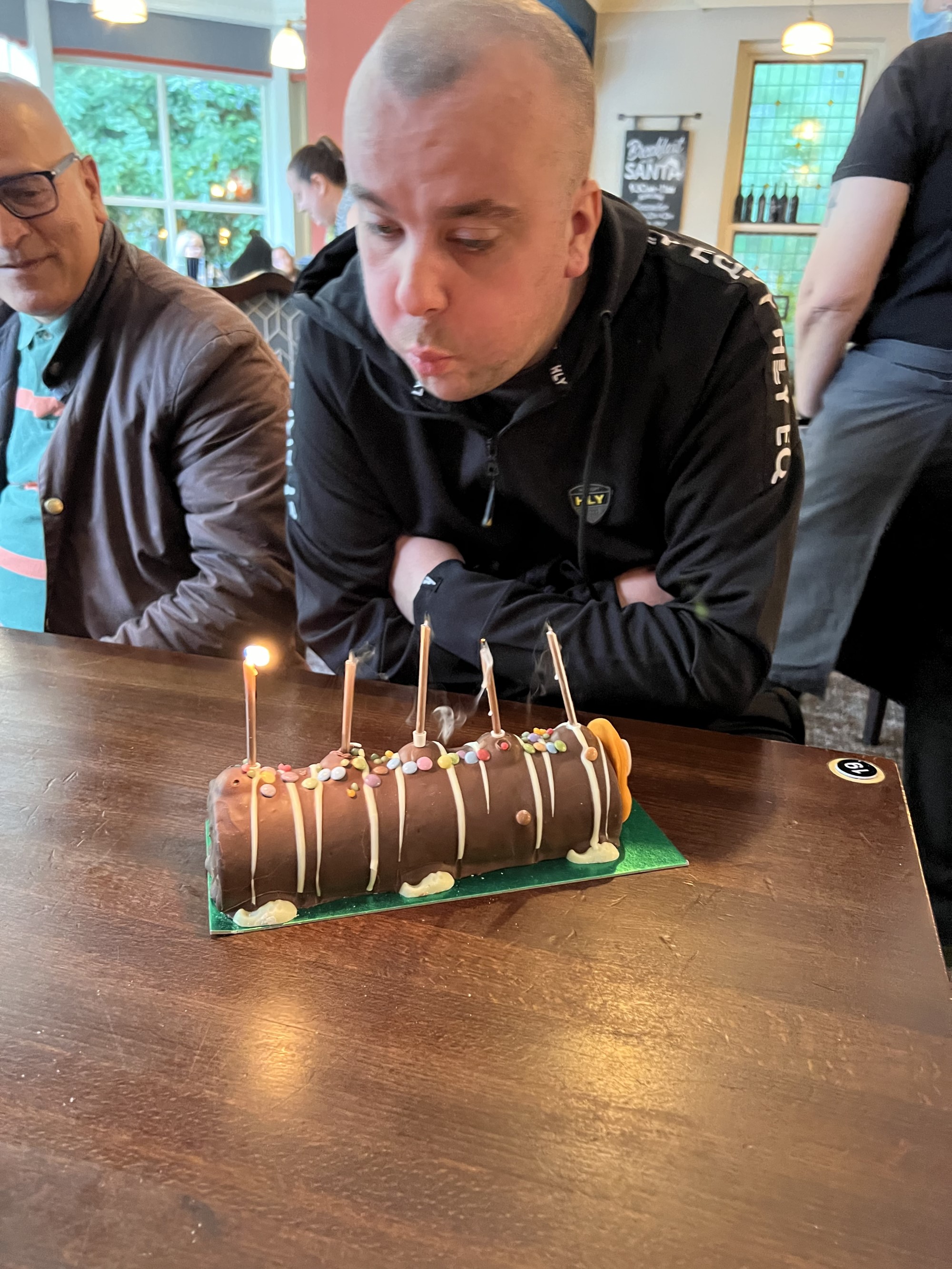 Person with birthday cake