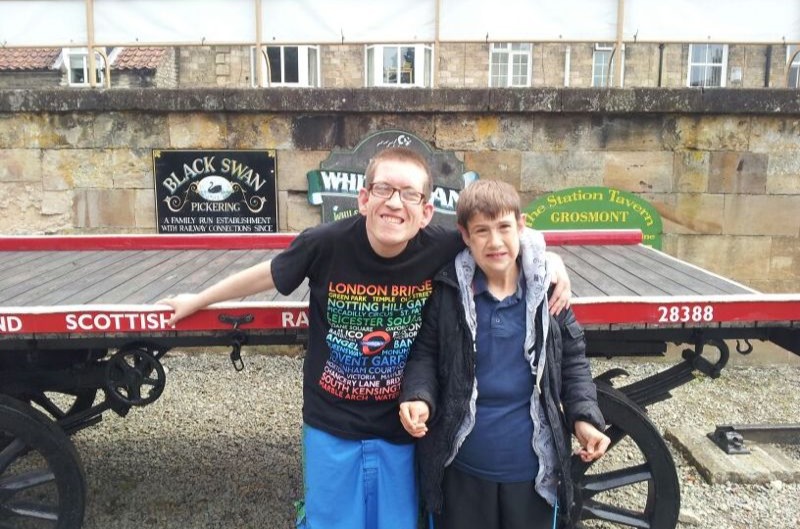 Two people smiling