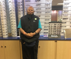 person in front of glasses 
